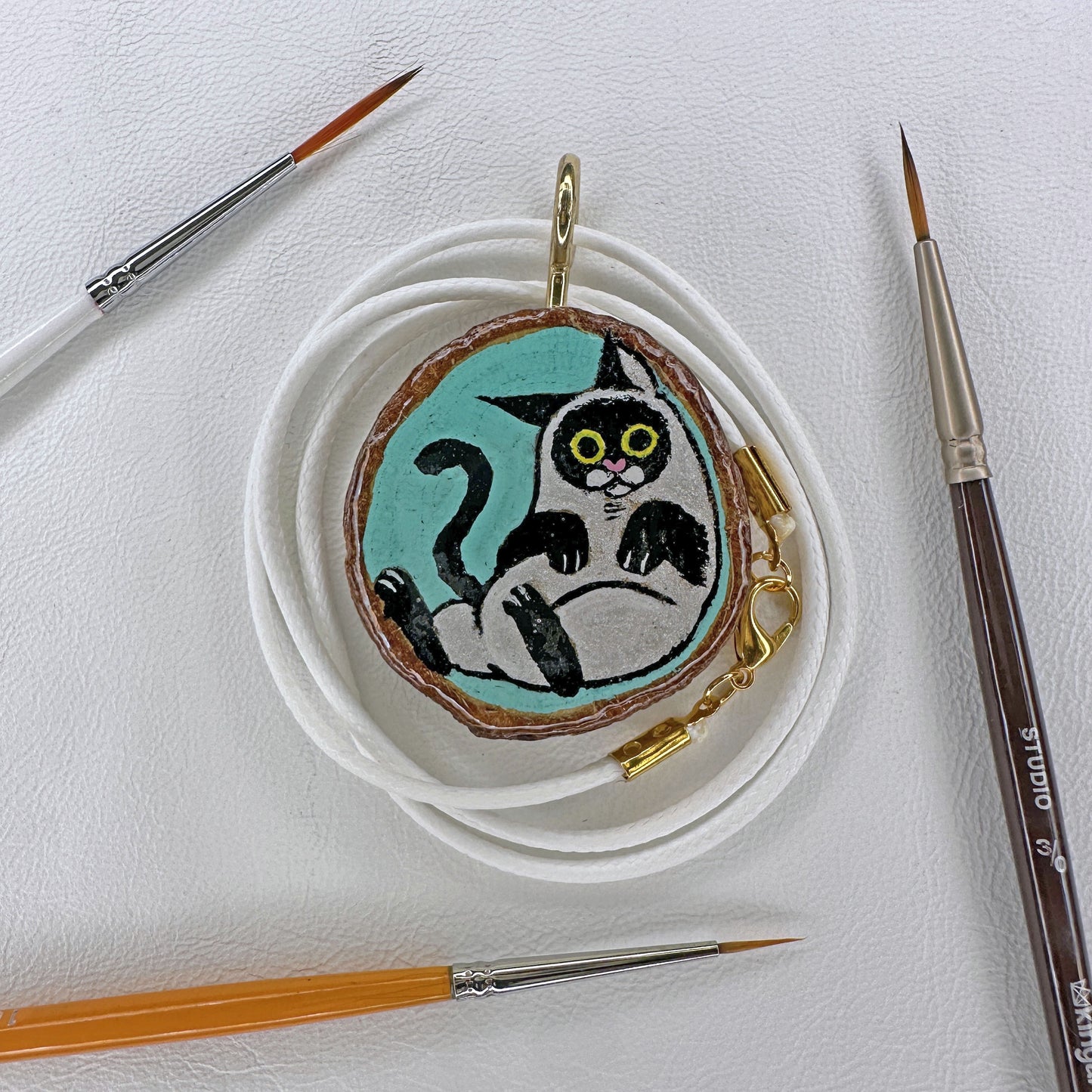 Lounging Ragdoll Cat Wooden Slice Pendant